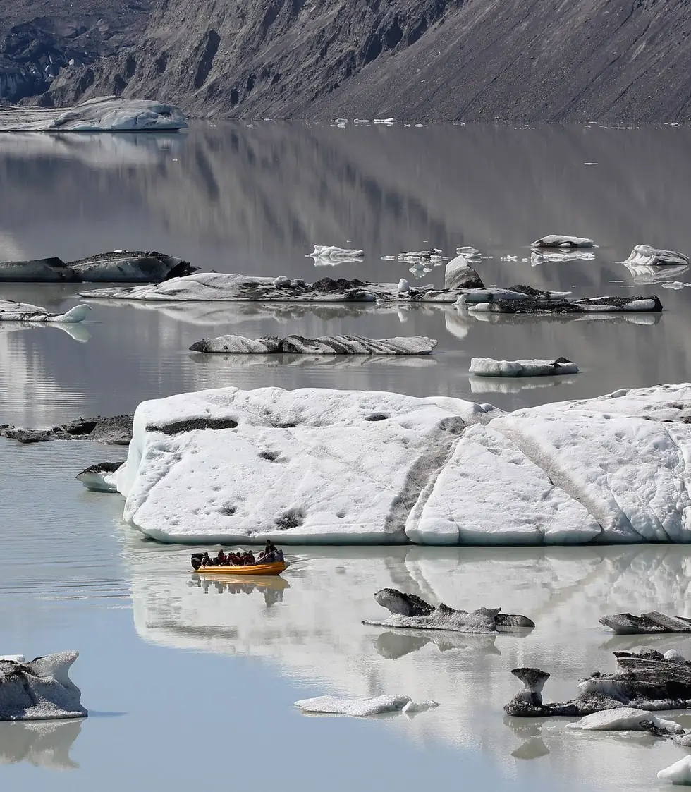 A boat among icebergs on the Tasman Glacier terminal lake