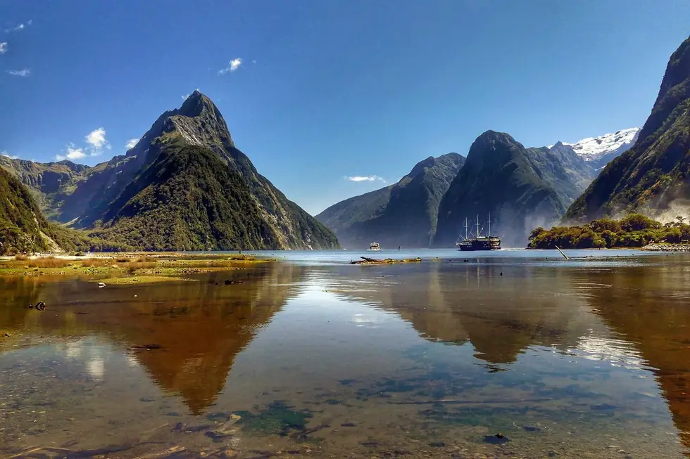 Milford Sound — Mitre Peak rising straight out of the water