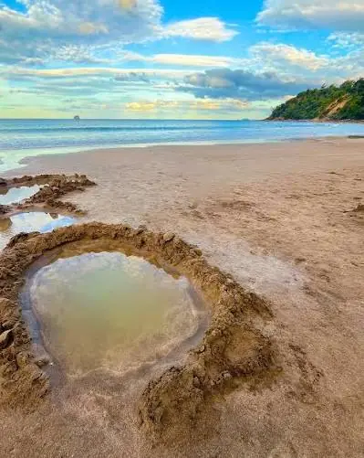Hot Water Beach — we dig our own pool at low tide
