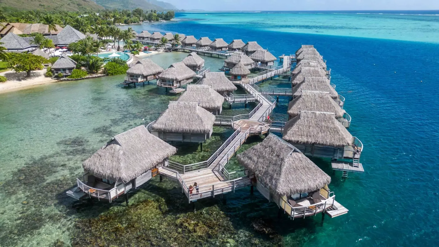 Manava Beach Resort & Spa Moorea from the air, showing the infinity pool, the small beach and the overwater bungalows