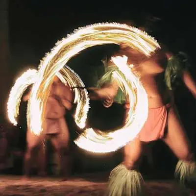 Fire dancers &mdash; the Destination Discovery Event on a private motu