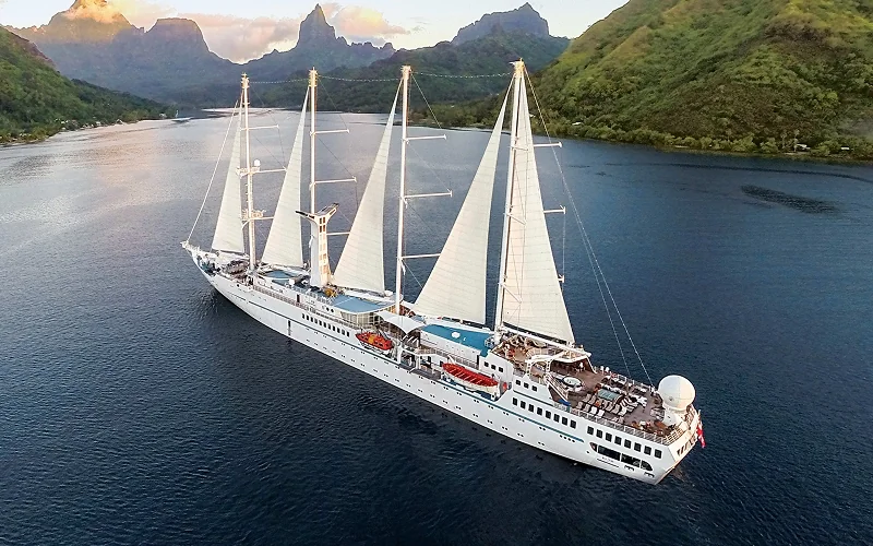 Wind Star under sail in a Tahitian lagoon